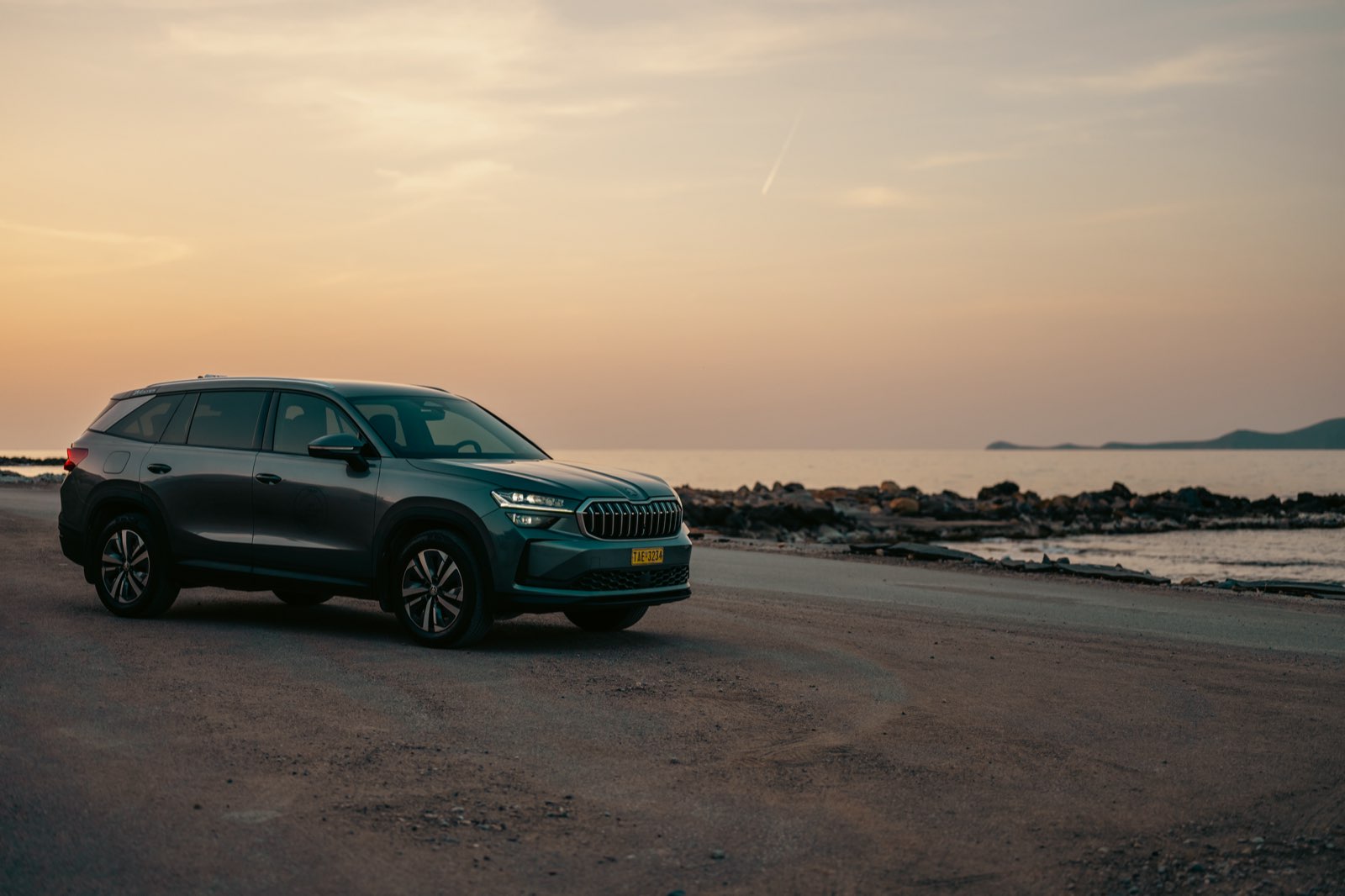 LP Taxi SUV on a coastal Crete road during golden hour